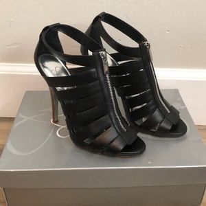 Black strappy heels with zipper